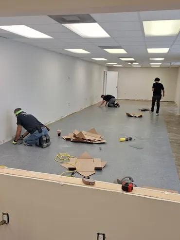 Immigration office flooring installation in progress