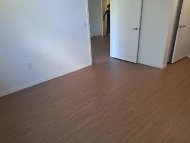 Jewish Federation finished bedroom with new vinyl plank flooring