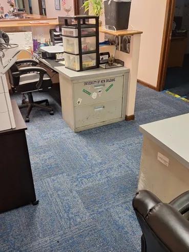 Singely Document One office workspace with finished blue carpet tile