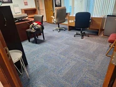 Singely Document One open office area with finished carpet tile