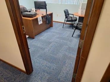 Singely Document One private office with finished blue carpet tile