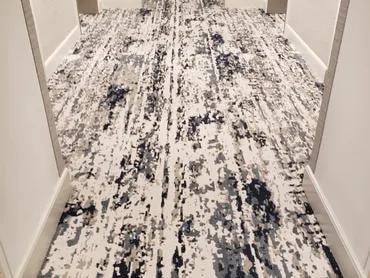 Tequesta Point Condominium finished hallway with new patterned carpet